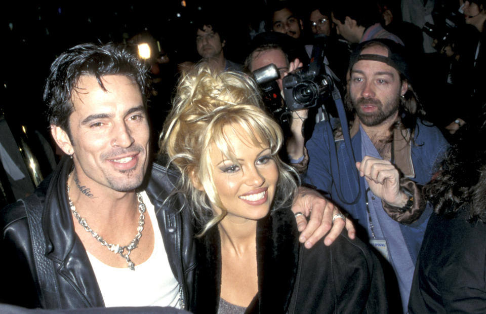 Tommy Lee And Pamela Anderson during Hard Rock Hotel & Casino Las Vegas Grand Opening Party Hosted by Peter Morton at Hard Rock Hotel & Casino in Las Vegas, Nevada, United States. (Photo by Jim Smeal/Ron Galella Collection via Getty Images)