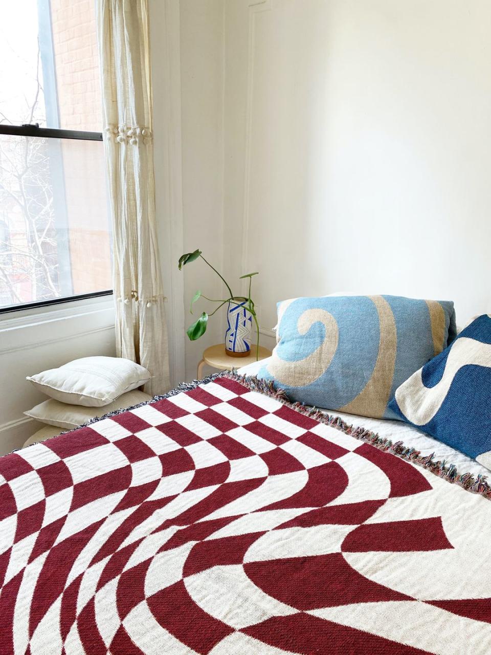 <p>Why are we happy to revive a tired sofa with a scatter of clashing cushions, but can’t see beyond matchy matchy set ups in the bedroom? These swirling designs are by Brooklyn-based textile studio CLR Shop, whose throws are woven in North Carolina’s Blue Ridge Mountains from eight miles of cotton. </p>