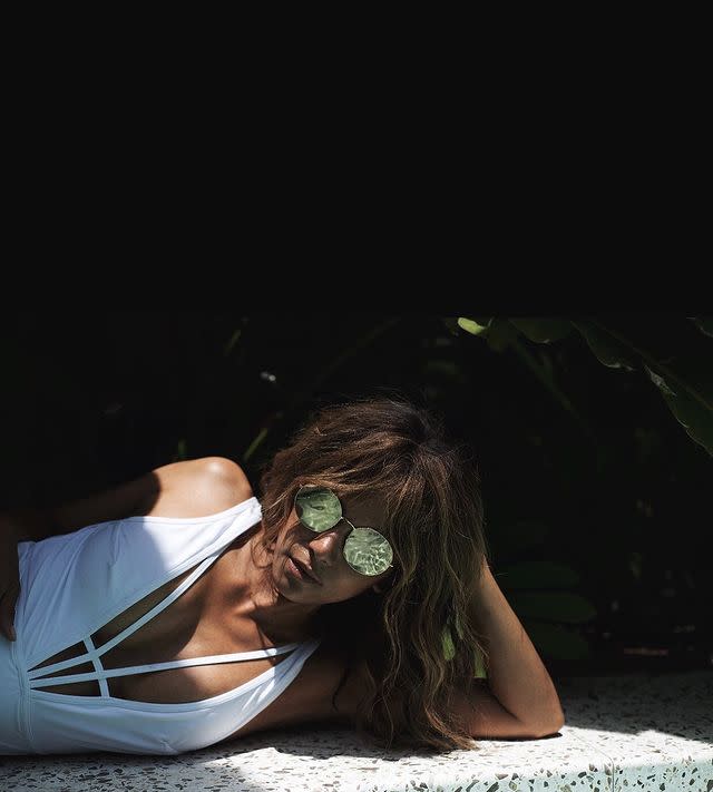 9) Halle Berry Wears Plungneck White Swimsuit, February 2020