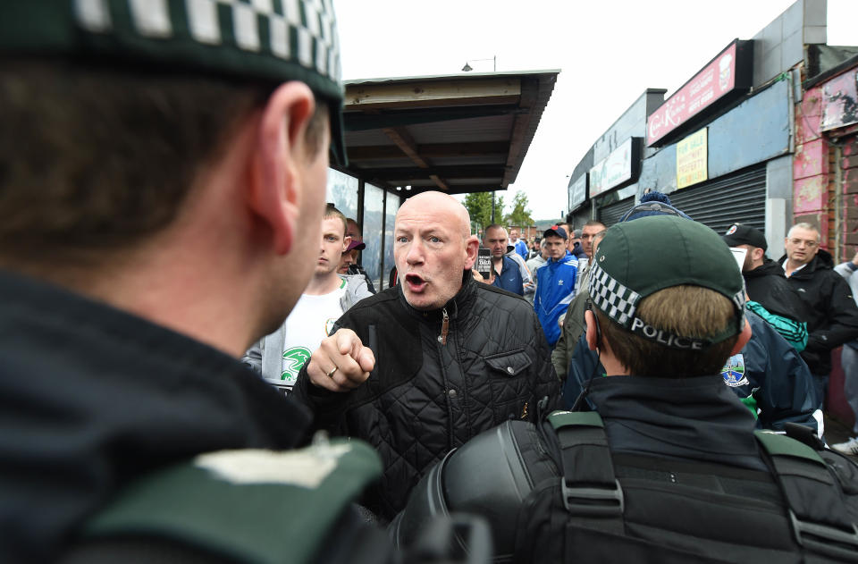 Protesters confront police officers during a march in Ardoyne in Belfast, Northern Ireland, in July 2016. Photo: Getty