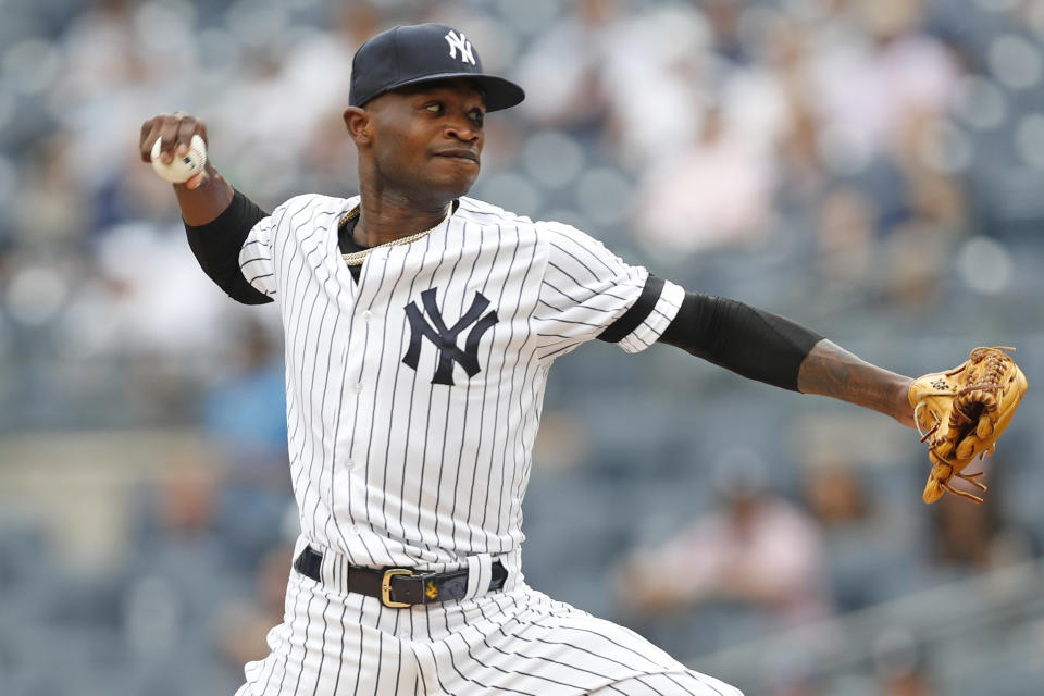 New York Yankees' starting pitcher Domingo German winds up during the first inning in the first game of a baseball doubleheader, Thursday, July 18, 2019, in New York. (AP Photo/Kathy Willens)x