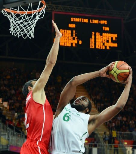 Nigerian forward Ike Diogu shoots during the Men's Preliminary Round Group A basketball match Nigeria vs Tunisia at the London 2012 Olympic Games , July 29, 2012 in London. Nigeria won 60-56