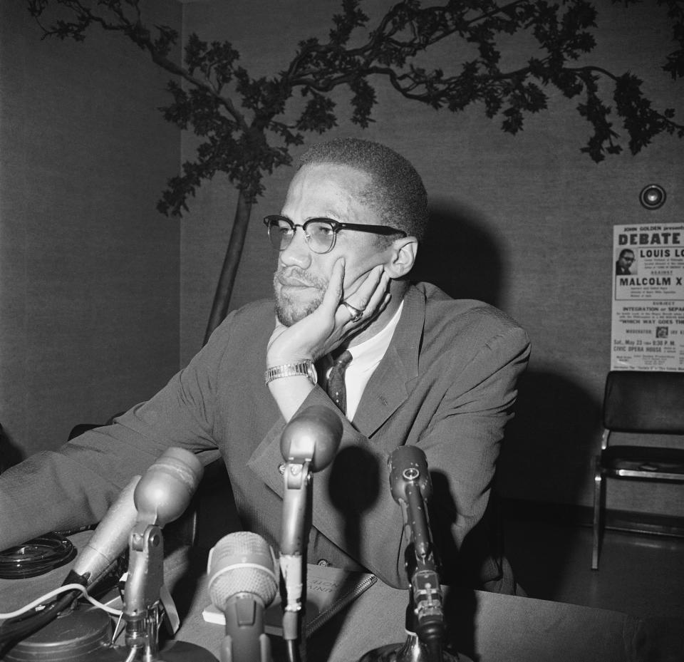 File - In this May 22, 1964, file photo, civil rights leader Malcolm X speaks during a press conference in Chicago. "Who Killed Malcolm X?" currently streaming on Netflix dives into questions surrounding his 1965 assassination and allegations of a botched investigation. (AP Photo/Edward Kitch, File)