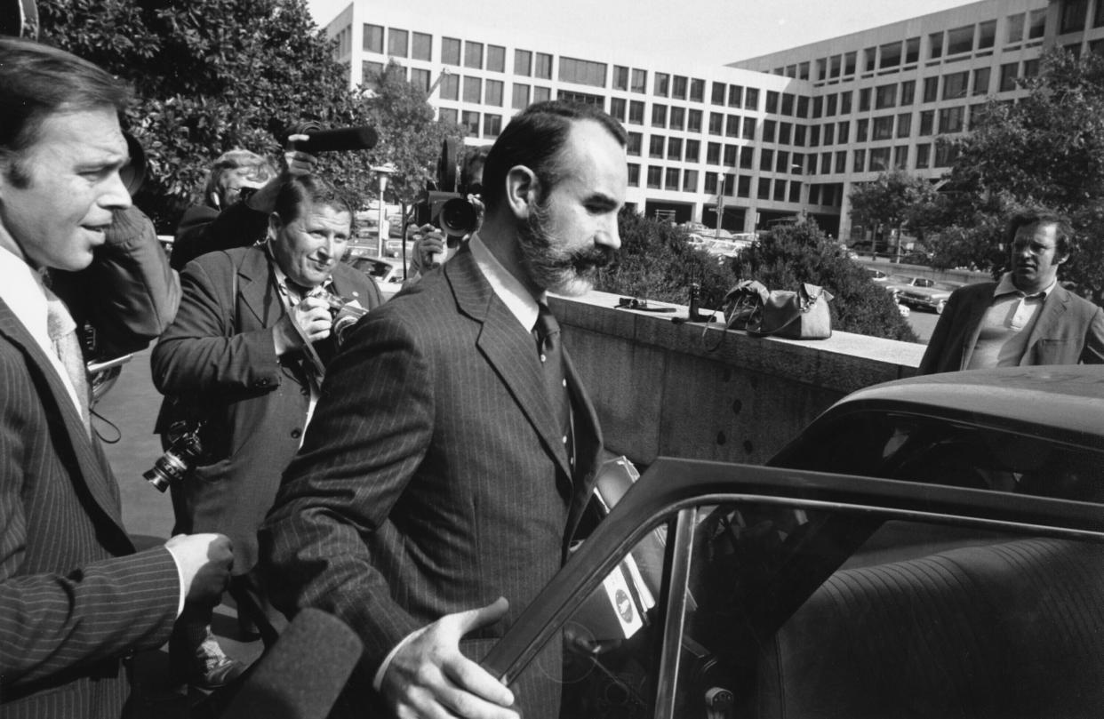 FILE - In this Oct. 15, 1974, file photo, G. Gordon Liddy wears a beard and a mustache upon his release in Washington. Liddy posted a $5,000 bond after serving 21 months in jail. Liddy, a mastermind of the Watergate burglary and a radio talk show host after emerging from prison, has died at age 90. His son, Thomas Liddy, confirmed the death Tuesday, March 30, 2021, but did not reveal the cause. (AP Photo/File)