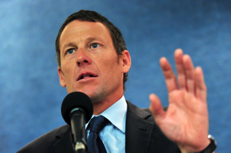 Lance Armstrong delivers remarks at a press conference held to urge Congress to oppose cuts to cancer research and prevention programs in Washington on March 24, 2011. On January 17, 2013, Armstrong, in an interview broadcast on OWN (the Oprah Winfrey Network), said he used banned substances and blood transfusions in all of his Tour de France wins. File Photo by Kevin Dietsch/UPI