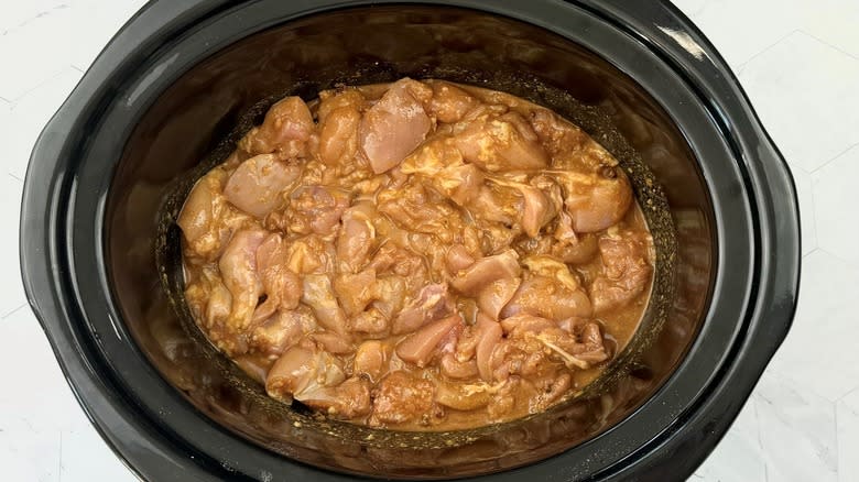 chicken with sauce in pot