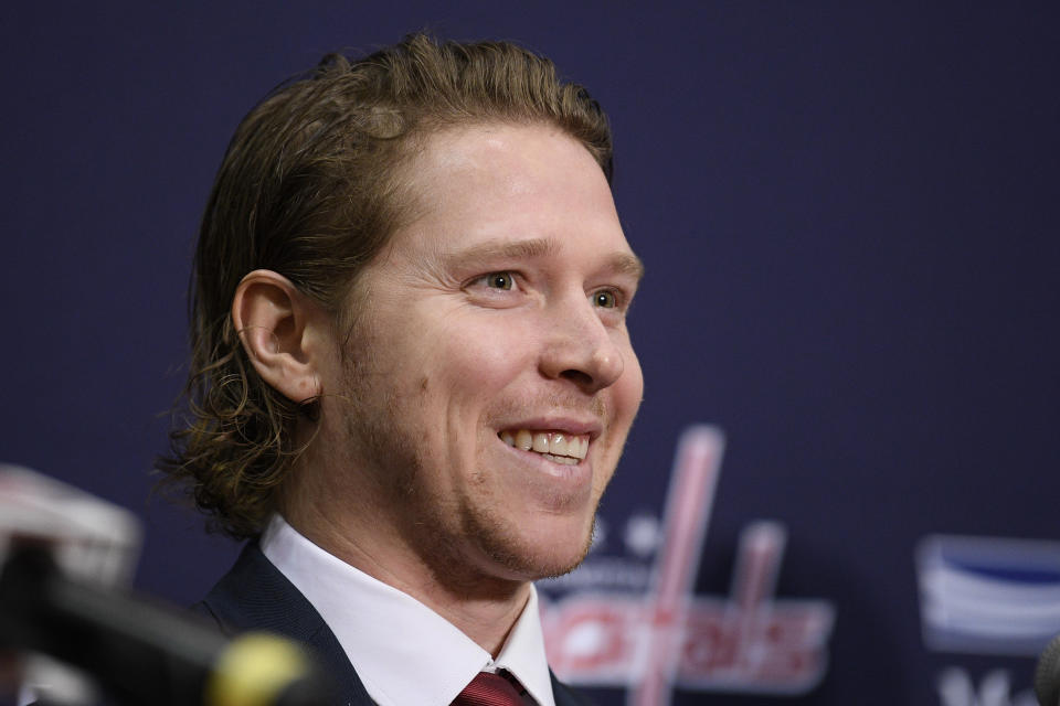 Washington Capitals center Nicklas Backstrom, of Sweden, reacts during an NHL hockey news conference about the Capitals re-signing him to a five-year contract, Tuesday, Jan. 14, 2020, in Washington. (AP Photo/Nick Wass)