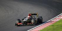 Lotus Formula One driver Romain Grosjean of France races during the Japanese F1 Grand Prix at the Suzuka circuit October 13, 2013. REUTERS/Issei Kato (JAPAN - Tags: SPORT MOTORSPORT F1)