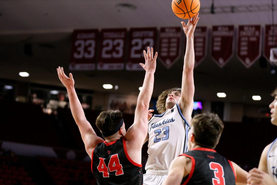 Edmond North's Dylan Warlick shoots over Westmoore's Zane Zielny during a Class 6A boys high school basketball state tournament game between Edmond North and Westmoore at Lloyd Noble Center in Norman, Okla., Wednesday, March 6, 2024.
