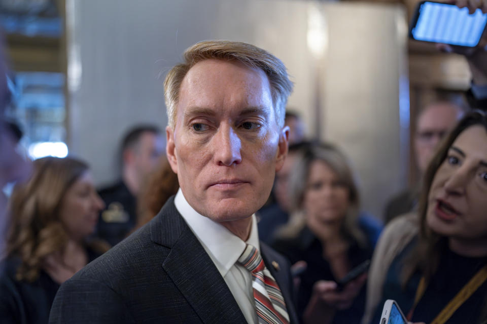 Sen. James Lankford, R-Okla., the lead GOP negotiator on a border-foreign aid package, speaks with reporters outside the chamber at the Capitol in Washington, Thursday, Jan. 25, 2024. Any bipartisan border deal could be doomed because of resistance from former President Donald Trump. (AP Photo/J. Scott Applewhite)