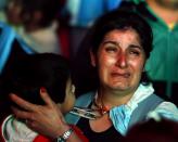 An Argentina fan reacts after Argentina lost to Germany in their 2014 World Cup final soccer match in Brazil, at a public square viewing area in Buenos Aires, July 13, 2014. REUTERS/Ivan Alvarado (ARGENTINA - Tags: SPORT SOCCER WORLD CUP)