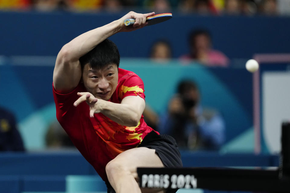 Table tennis player Ma Long makes history for China at Paris Games with