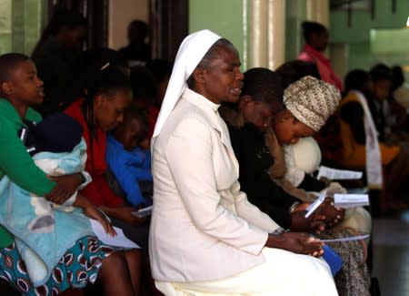 Congregants attend Sunday Mass at Zimbabwe's founding father Robert Mugabe's church in Harare