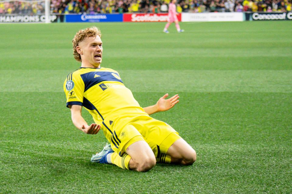 Nashville SC forward Jacob Shaffelburg (14) celebrates his goal against Inter Miami during the first half of the CONCACAF Champions Cup round of 16 on March 7, 2024 at GEODIS Park in Nashville, Tennessee.