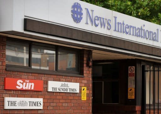 News International's headquarters in east London, pictured in 2011. A British parliamentary report says Rupert Murdoch showed "wilful blindness" over phone hacking at his News of the World tabloid and was not fit to run a major company