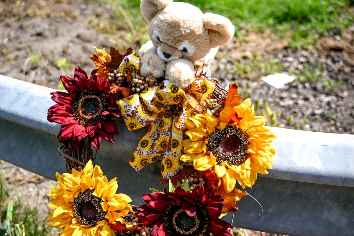 A detailed look at a portion of a memorial for those killed and injured on Saturday displayed at the entrance to the Gloria Miller Looking Glass Valley Park on Monday, May 20, 2024, in Watertown Township.