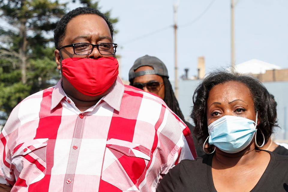 jacob blake sr and julia jackson wear masks at a march