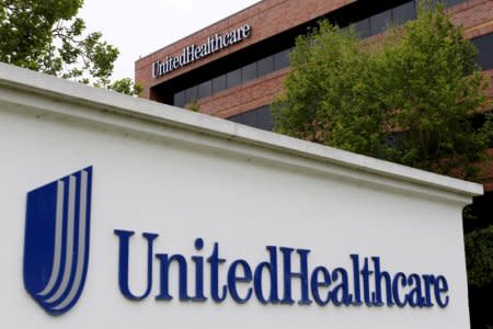 FILE PHOTO: The logo of Down Jones Industrial Average stock market index listed company UnitedHealthcare is shown in Cypress, California April 13, 2016.  REUTERS/Mike Blake/File Photo