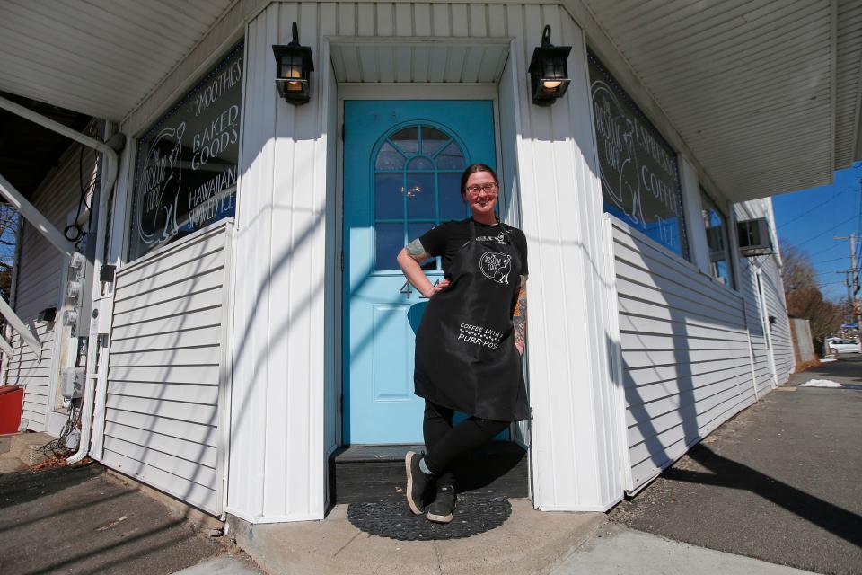 Joni Rhodes stands in front of her newly opened The Rescue Cafe on Main Street in Fairhaven.