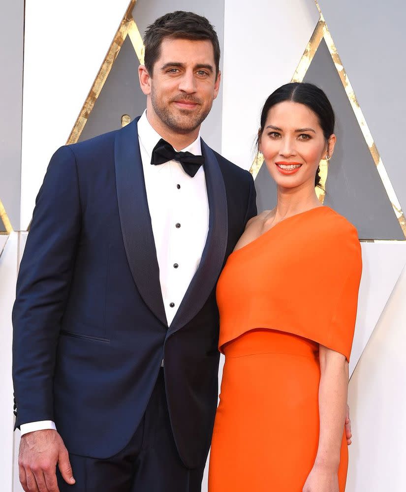 Aaron Rodgers (left) and Olivia Munn