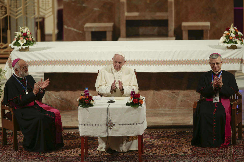 Pope Francis sits during a meeting with Catholic priests and other Christian representatives in the cathedral of the capital, Rabat, Morocco, Sunday, March 31, 2019. Pope Francis is in Morocco for a two-day trip aimed at highlighting the North African nation's Christian-Muslim ties, while also showing solidarity with migrants at Europe's door and tending to a tiny Catholic flock. (AP Photo/Mosa'ab Elshamy)