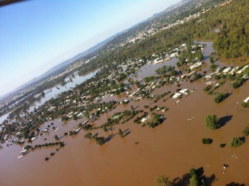 This photo provided by New South Wales Premier Barry O'Farrell shows floodwaters at North Wagga Wagga. Hundreds more people were evacuated Wednesday in Australia's flood-hit southeast, as residents of sodden Wagga Wagga breathed a sigh of relief after a levee on the swollen Murrumbidgee River held firm