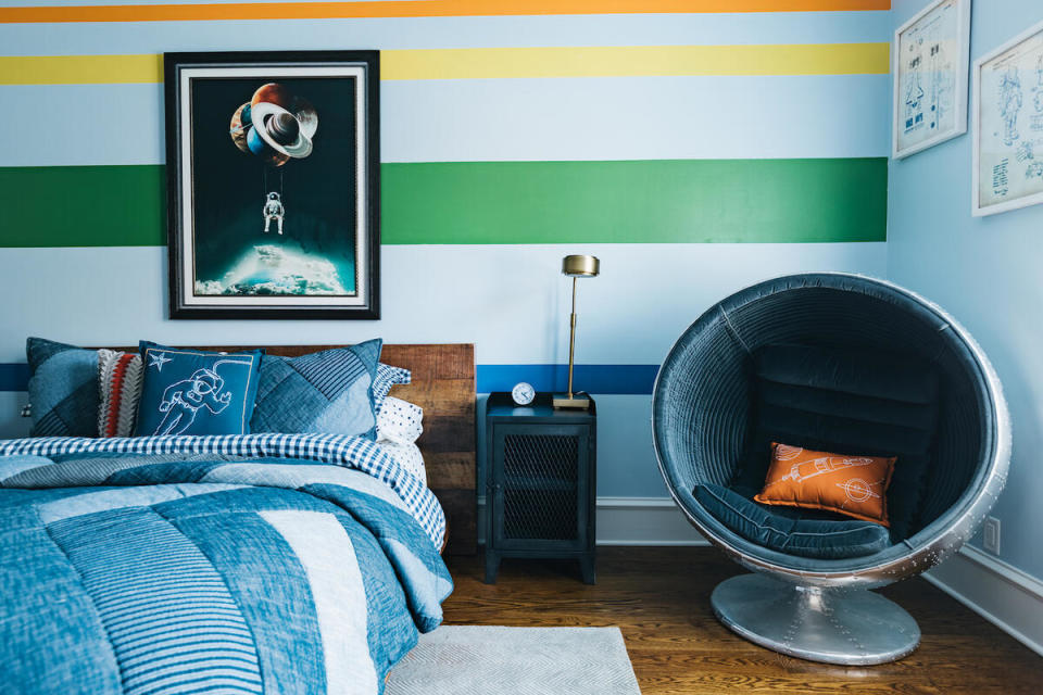 Bold stripes add graphic appeal in a boy’s bedroom