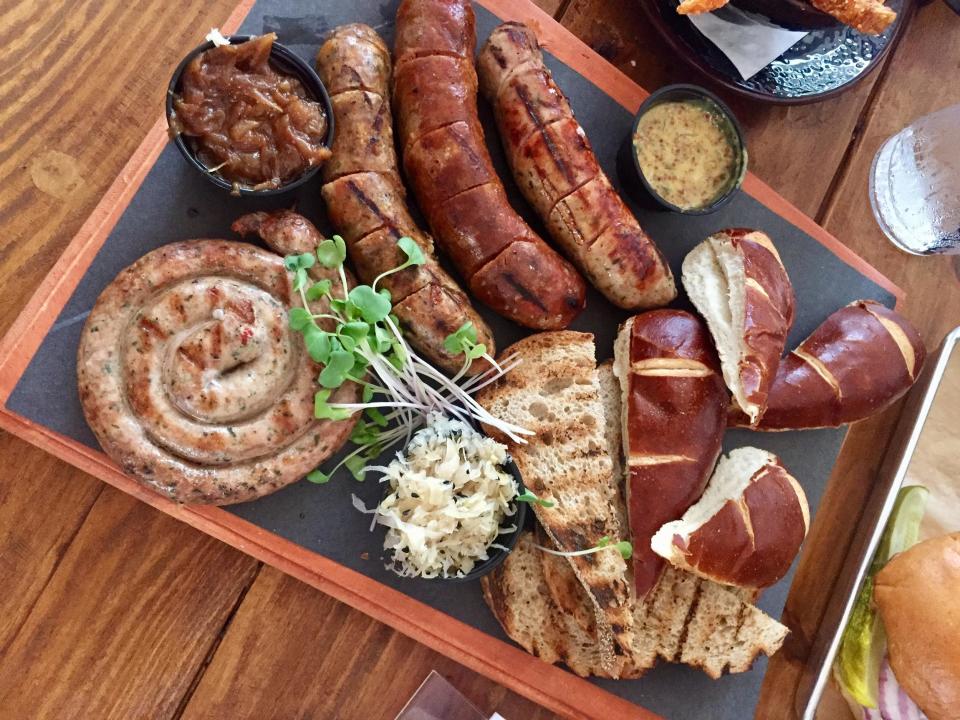 A sampling of The Butcher Shop's house-made sausages and condiments.