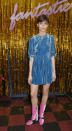 <p>Model Lara Mullen demonstrated how to rock winter velvet in a sky blue mini dress and ankle boots. <em>[Photo: Getty]</em> </p>