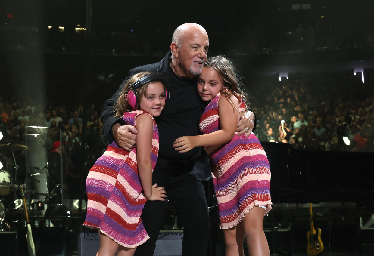 NEW YORK, NEW YORK - JULY 25:  Della Rose Joel, Billy Joel  and Remy Joel perform onstage during the last show of Billy Joel's residency at Madison Square Garden on July 25, 2024 in New York City. (Photo by Kevin Mazur/Getty Images)