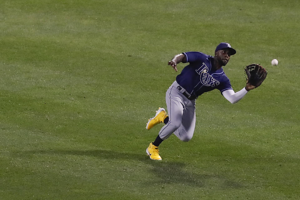 Tampa Bay Rays left fielder Randy Arozarena makes the catch on a fly out by Boston Red Sox Enrique Hernandez during the first inning during Game 4 of a baseball American League Division Series, Monday, Oct. 11, 2021, in Boston. (AP Photo/Michael Dwyer)