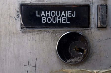 The name Mohamed Lahoualej Bouhlel is seen on a plate outside the building where he lived in Nice, France, July 17, 2016. REUTERS/Eric Gaillard