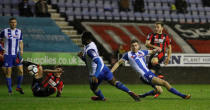 Soccer Football - FA Cup Third Round Replay - Wigan Athletic vs AFC Bournemouth - DW Stadium, Wigan, Britain - January 17, 2018 Bournemouth's Ryan Fraser shoots at goal REUTERS/Phil Noble