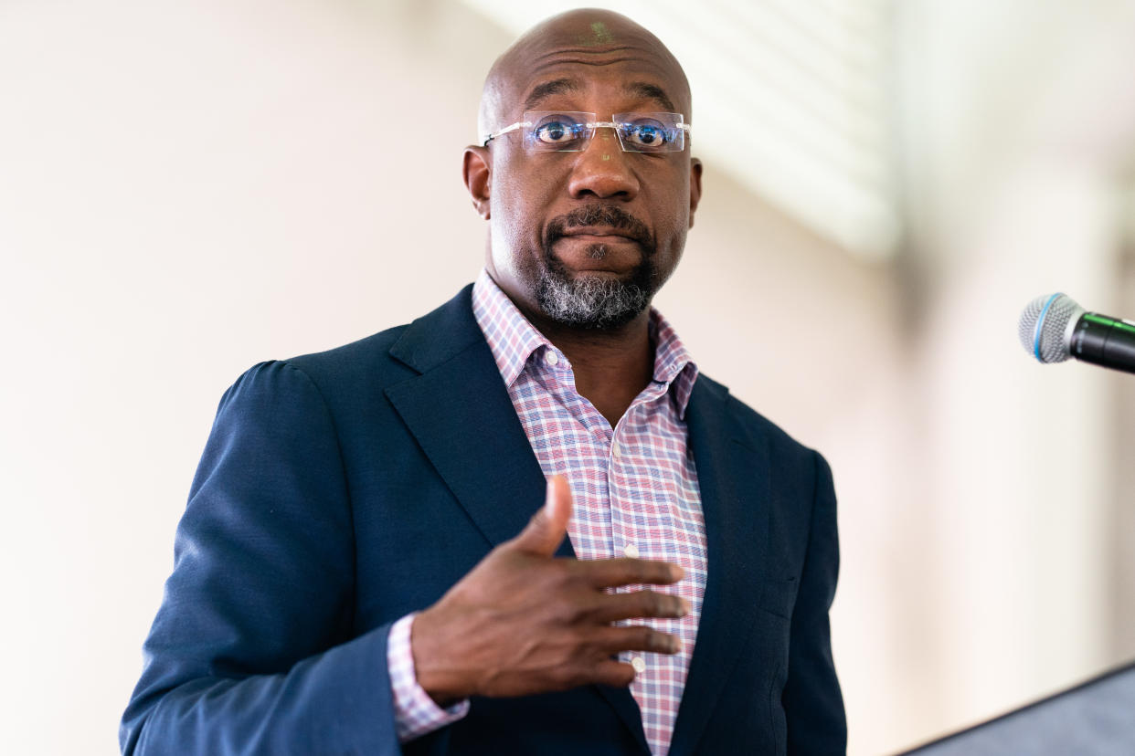 Sen. Raphael Warnock, a Democrat from Georgia, speaks at a campaign rally in Conyers, Ga., in August. 