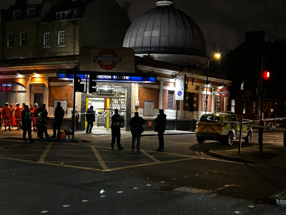 Police outside the station on Wednesday night (Jonathan Kanengoni)