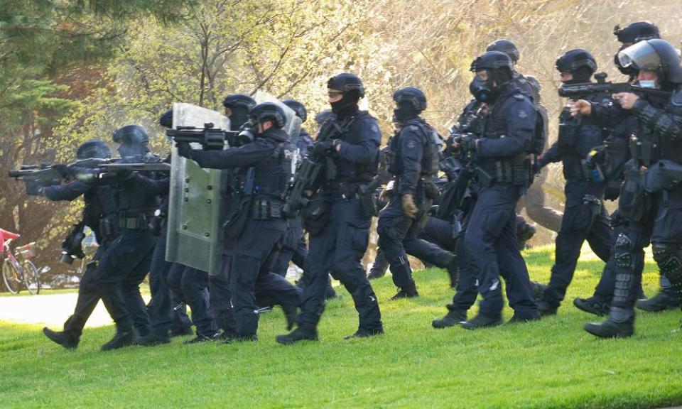 Riot officers clear protesters from the Shrine of Remembrance. Victoria police have been criticised for heave-handed tactics during the protests.