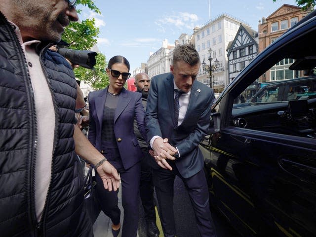 Rebekah and Jamie Vardy leave the Royal Courts of Justice, London