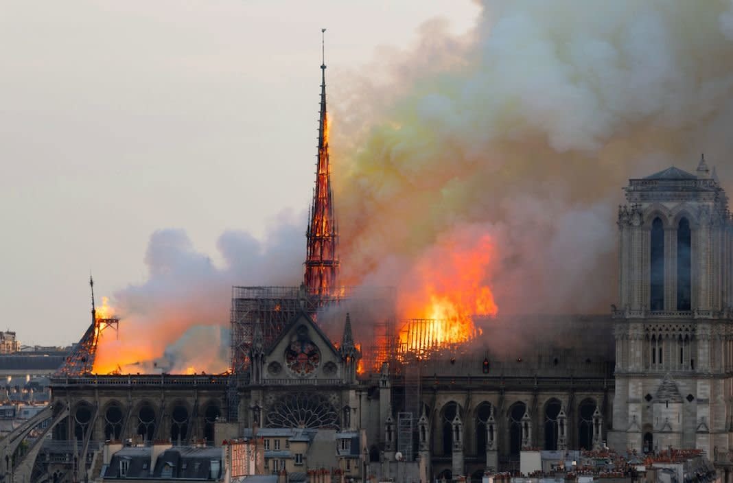 A massive fire on Monday ravaged the 850-year-old Gothic building, destroying much of its roof and causing its spire to collapse. (Getty)  
