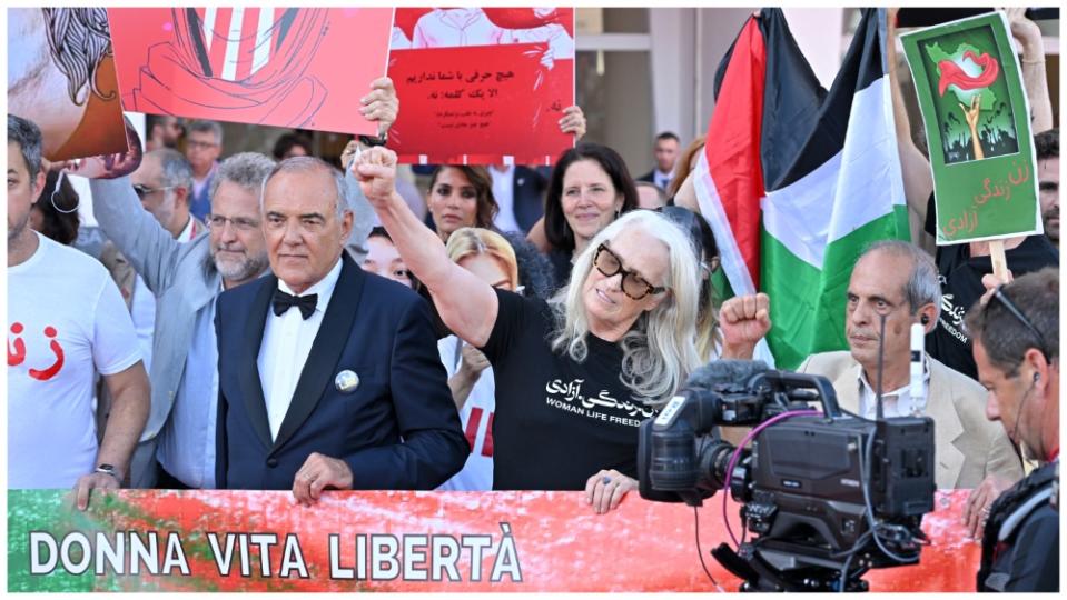 Director of the festival Alberto Barbera and jury member Jane Campion attend a Flash Mob in Solidarity With Iranian People After Saeed Roustaee Conviction during a red carpet for the movie "Maestro" at the 80th Venice International Film Festival on September 02, 2023 in Venice, Italy. (Photo by Kristy Sparow/Getty Images)