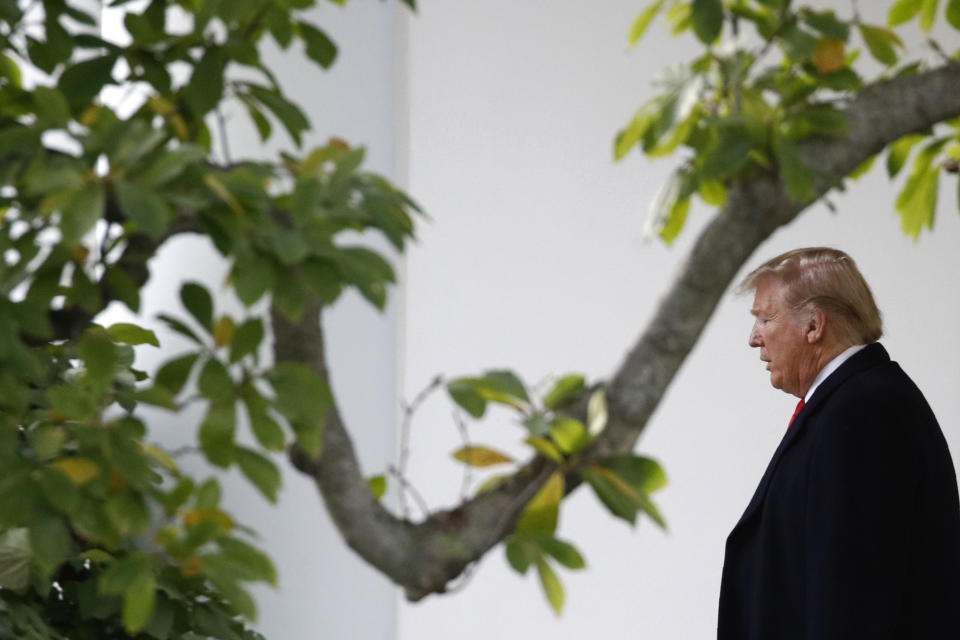 President Donald Trump walks out of the Oval Office to speak to members of the media on the South Lawn of the White House in Washington on Monday. (Photo: Patrick Semansky/AP)