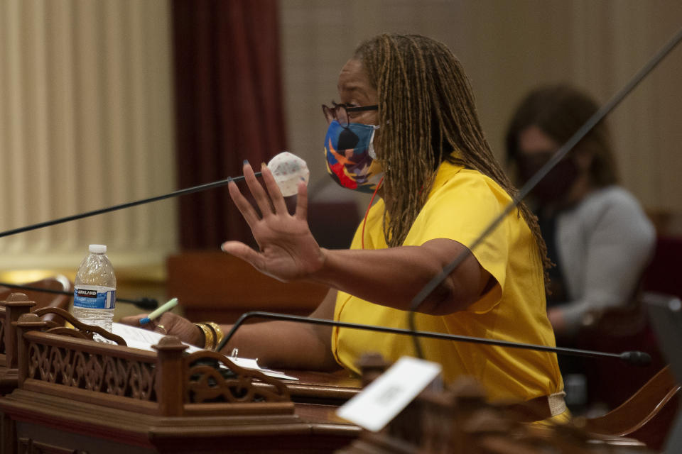 State Sen. Holly Mitchell, D- Los Angeles, questions Corrections Secretary Ralph Diaz, about the coronavirus outbreak at San Quentin State Prison during a Senate oversight hearing in Sacramento, Calif., Wednesday, July 1, 2020. Lawmakers criticized state corrections officials for inadvertently transferring infected inmates from a Southern California prison to San Quentin, near San Francisco, triggering the state's worst prison coronavirus outbreak. (AP Photo/Rich Pedroncelli)