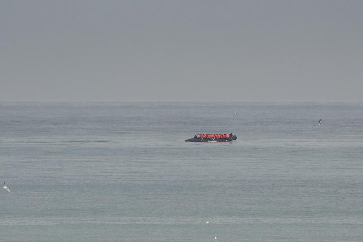 Migrant boat seen trying to make an apparent crossing of English Channel a day after 12 people died