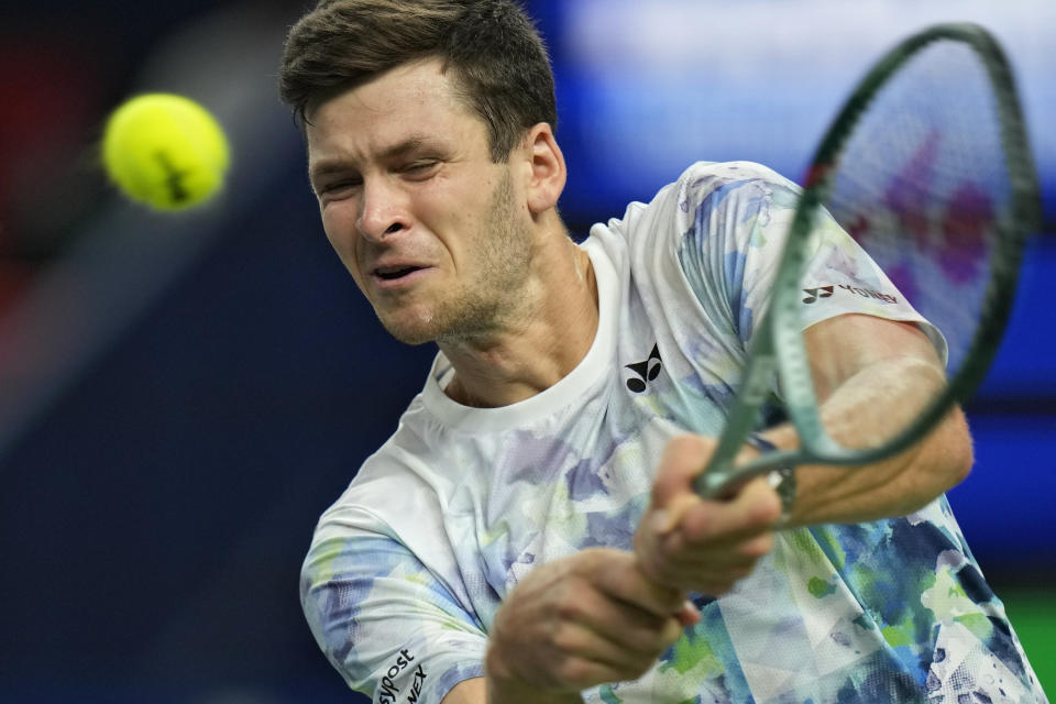 Hubert Hurkacz of Poland returns a shot to Andrey Rublev of Russia during the men's singles final match of the Shanghai Masters tennis tournament at Qizhong Forest Sports City Tennis Center in Shanghai, China, Sunday, Oct. 15, 2023. (AP Photo/Andy Wong)