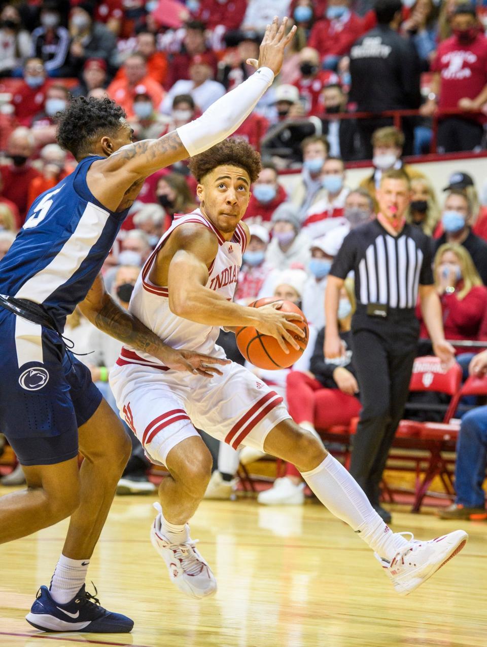 Indiana's Rob Phinisee (1) drives on Penn State's Greg Lee (5) during the first half of the Indiana versus Penn State men's basketball game at Simon Skjodt Assembly Hall.