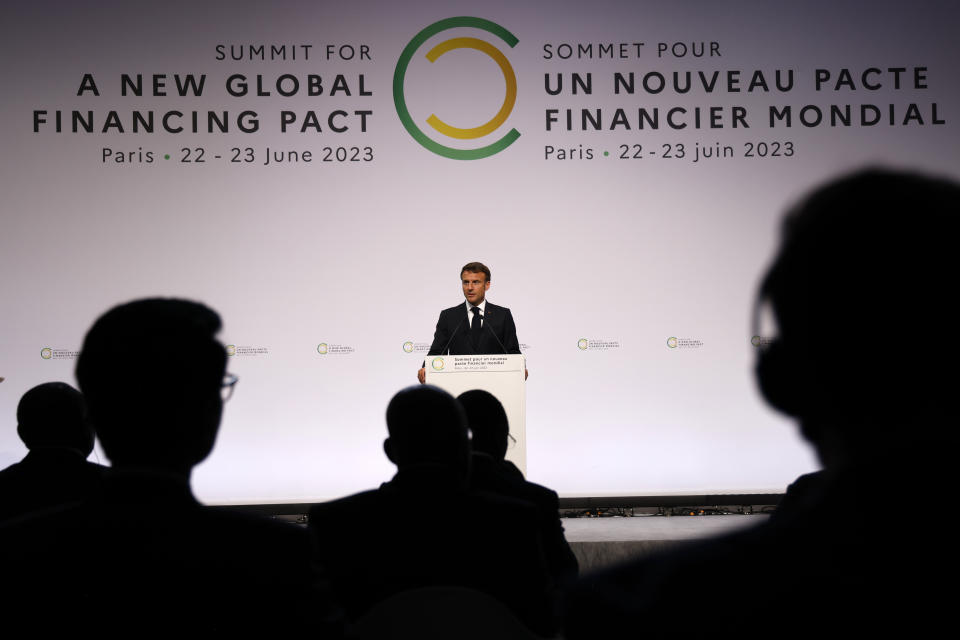 French President Emmanuel Macron delivers a speech during the opening session at the New Global Financial summit in Paris Thursday, June 22, 2023. World leaders, heads of international organizations and activists are gathering in Paris for a two-day summit aimed at seeking better responses to tackle poverty and climate change issues by reshaping the global financial system. (Ludovic Marin, Pool via AP)