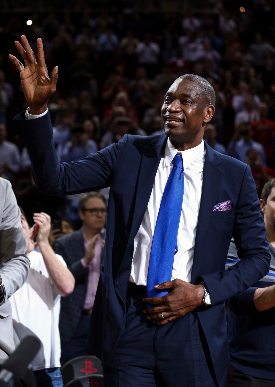 Former Houston Rockets player Dikembe Mutombo is honored before the second quarter of a game.