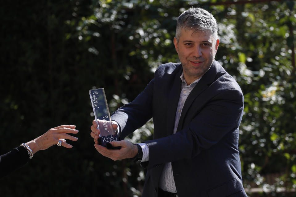 Director Evgeny Afineevsky is awarded with the Kineo Movie for Humanity award at the Vatican, Thursday, Oct. 22, 2020. Director Evgeny Afineevsky was awarded with Kineo prize Thursday for the movie "Francesco". (AP Photo/Alessandra Tarantino)