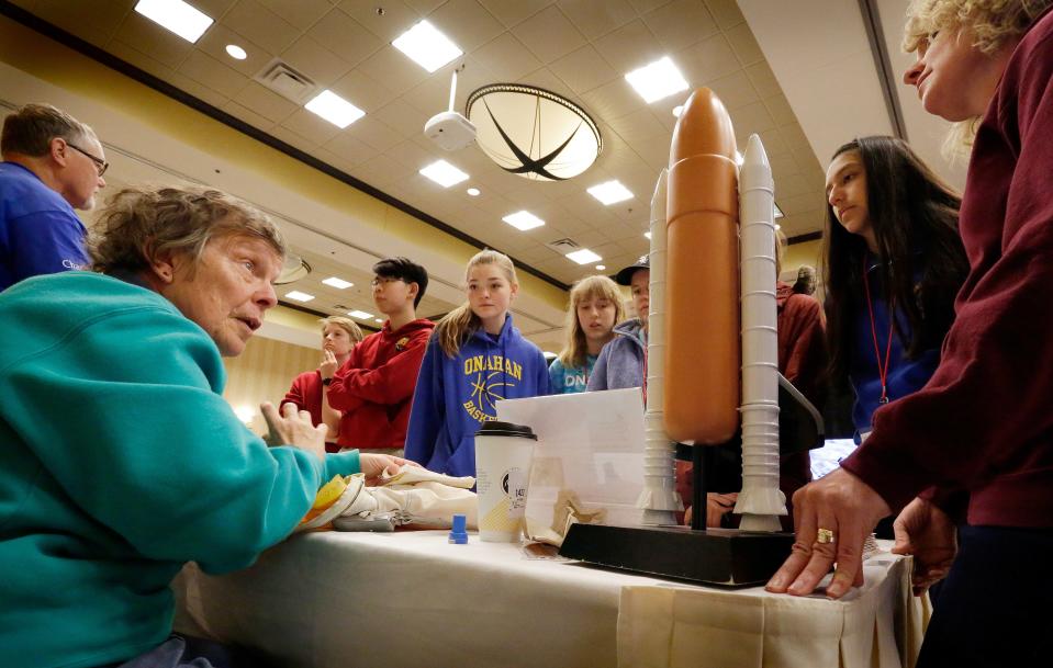 Spaceport Sheboygan's Judy Schieble explains nuances of what astronauts did while in space during a presentation at Rockets for Schools at Blue Harbor Resort, Friday, May 11, 2018, in Sheboygan, Wis.