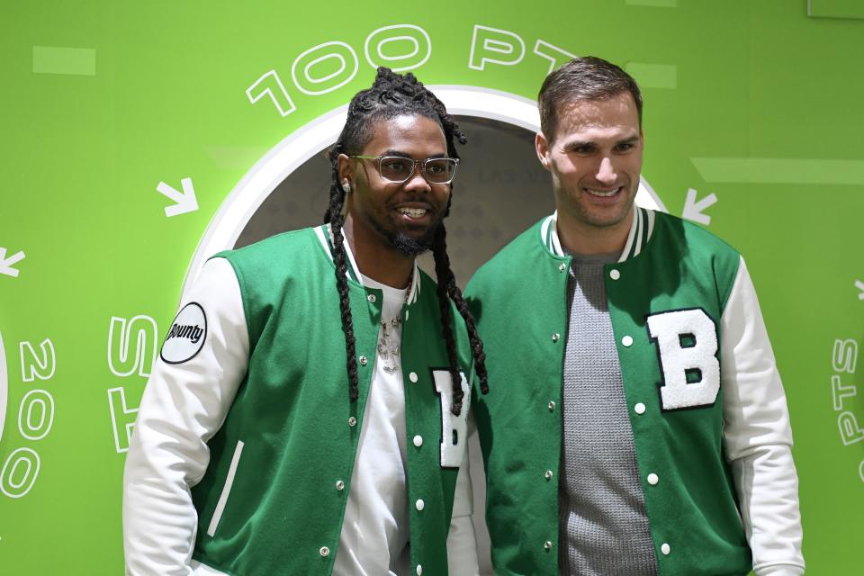 LAS VEGAS, NEVADA - FEBRUARY 09: K.J. Osborn and Kirk Cousins pose for a photo at Radio Row at the Mandalay Bay Convention Center ahead of Super Bowl LVIII on February 09, 2024 in Las Vegas, Nevada. (Photo by Candice Ward/Getty Images)