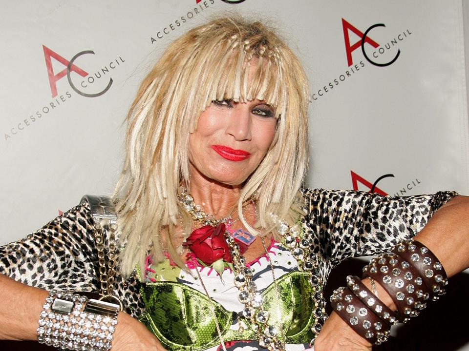 Betsey Johnson poses at an event